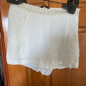 Bebe gold sequin white shorts
